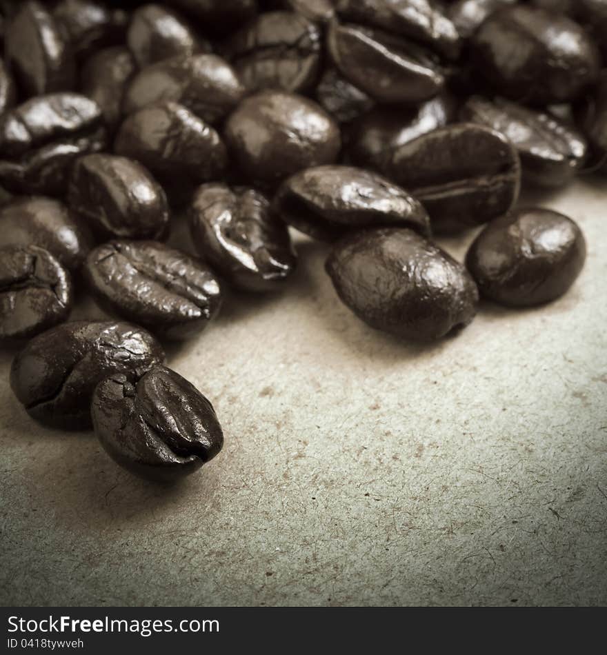 Closeup coffee beans on cardboard