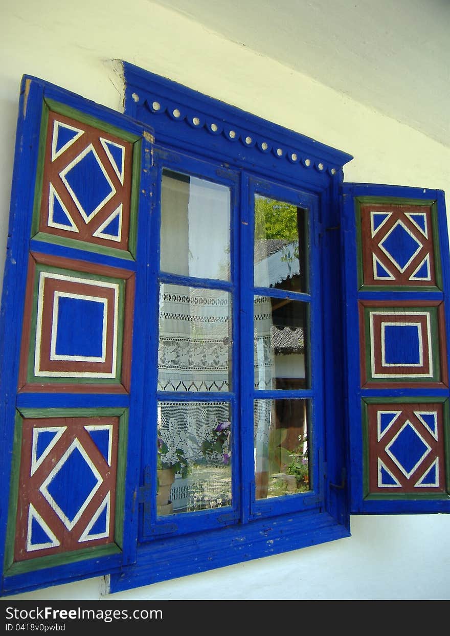 Blue window with geometrical theme