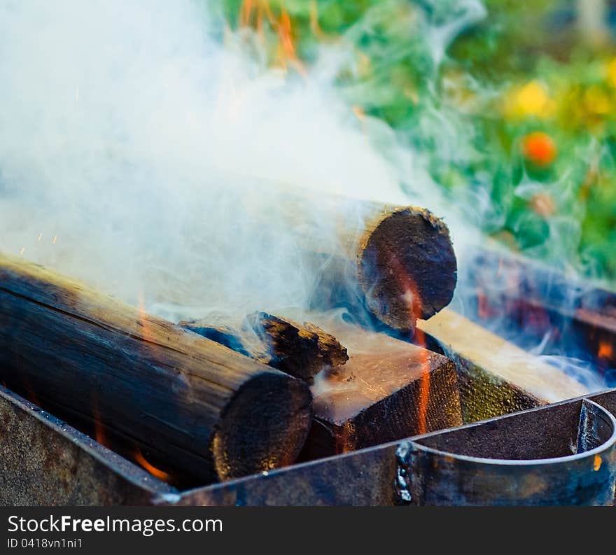 Hot, red burning firewood of campfire. Hot, red burning firewood of campfire