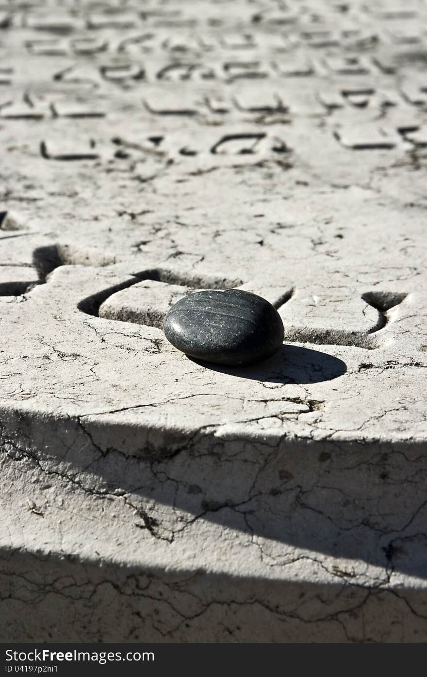 Traditional pebble on Jewish grave. Traditional pebble on Jewish grave