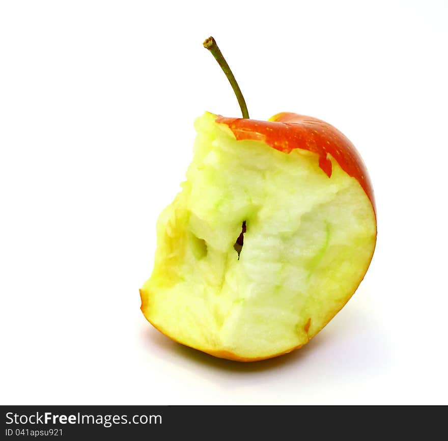 Apple core on a white background closeup