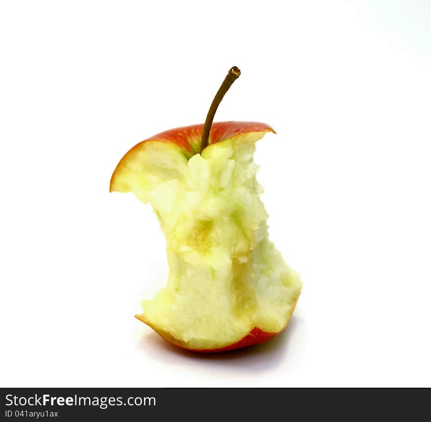 Apple core on a white background closeup