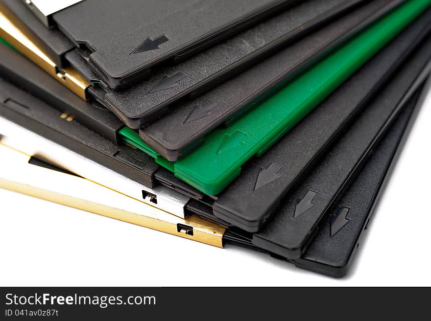 Corners of diskettes with arrows on a white background