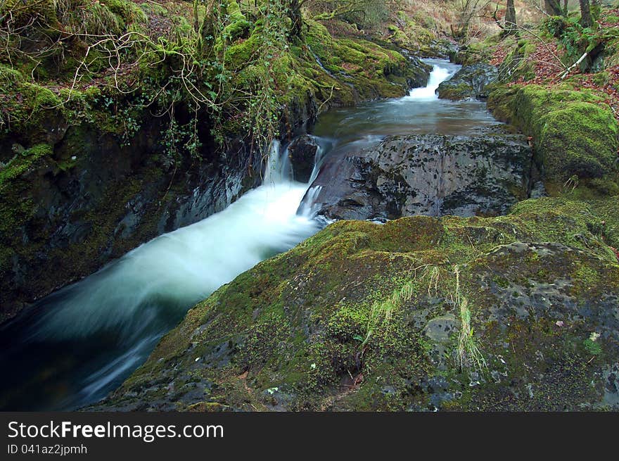 A stream with cascades near Okehampton, on dartmoor, devon, england. A stream with cascades near Okehampton, on dartmoor, devon, england