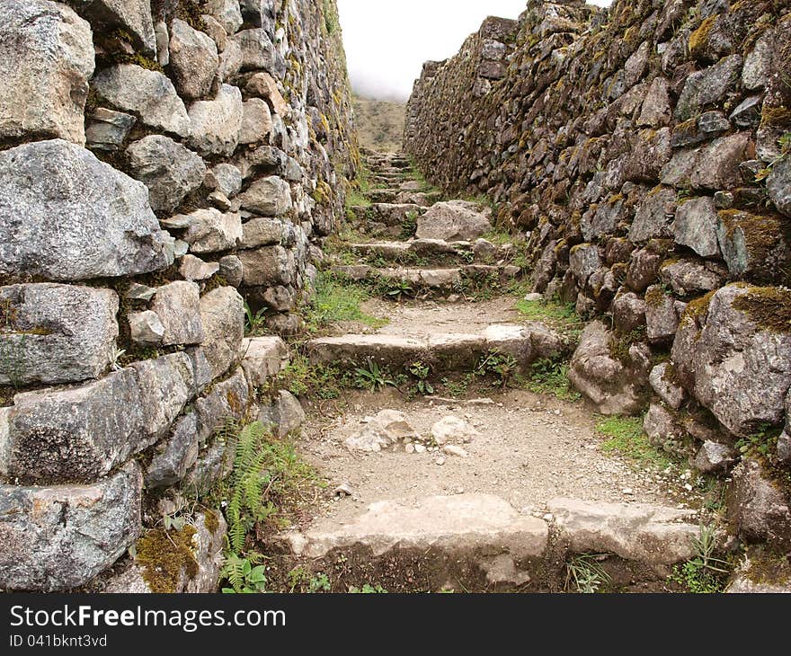 Inca trail between stone walls