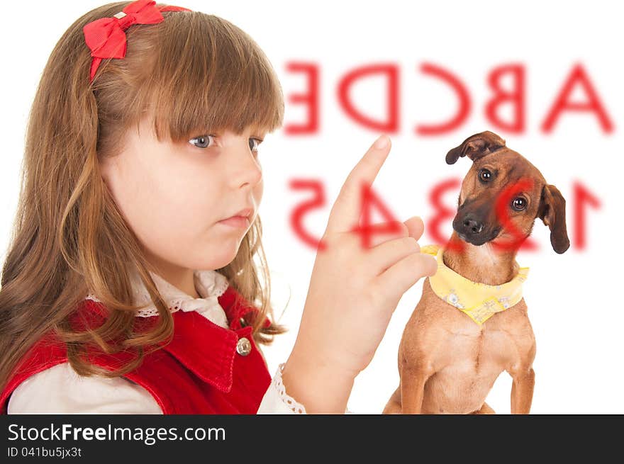 Little girl showing her pet letters. Little girl showing her pet letters