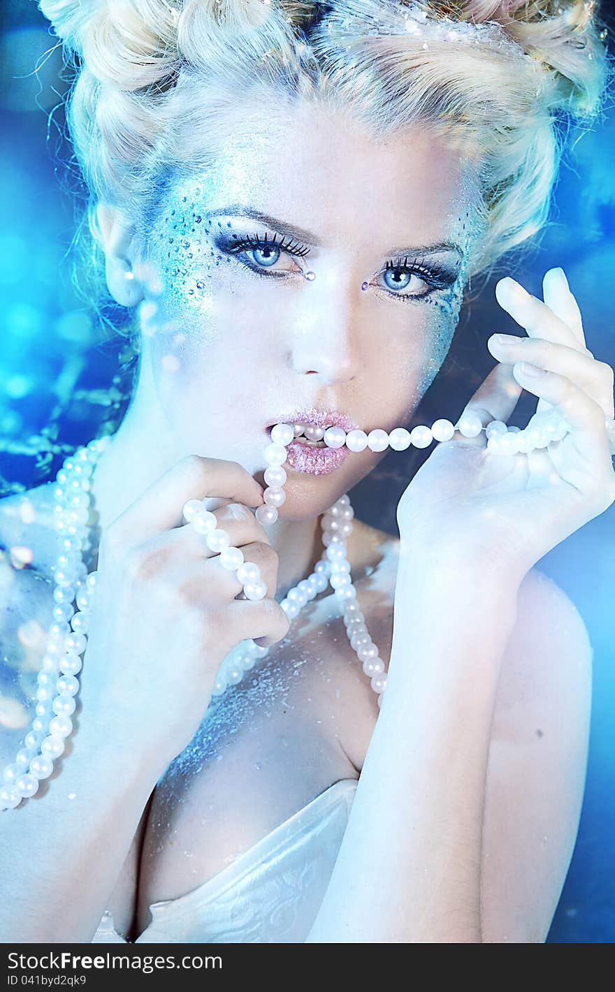 Portrait of the snow queen with a beautiful make-up