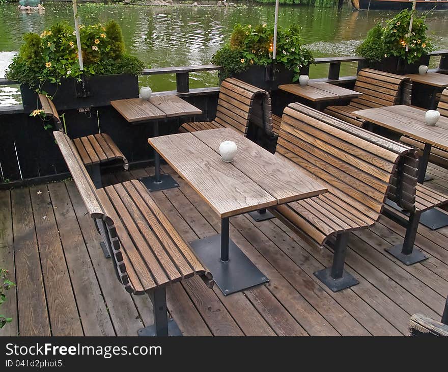 Outdoor restaurant cafe by a lake Tivoli Gardens Copenhagen Denmark