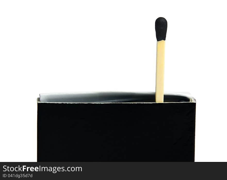 Black matches box and one match