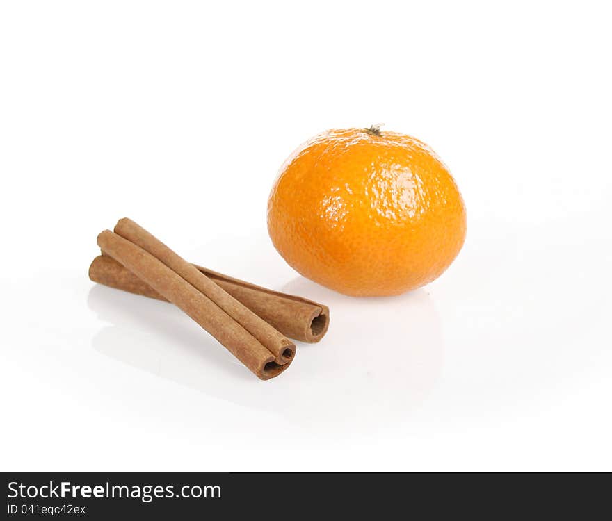 Orange fruit segment and cinnamon sticks