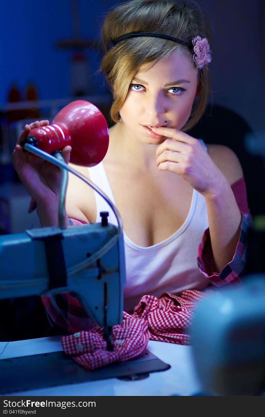 Seductive Blond Sewing In Her Workshop