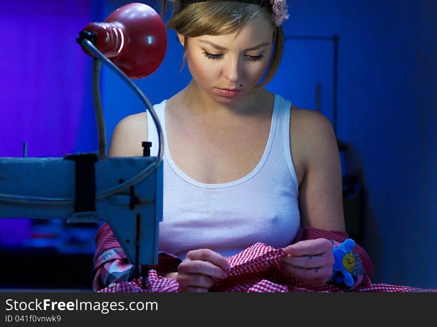 Seductive Blond Sewing In Her Workshop