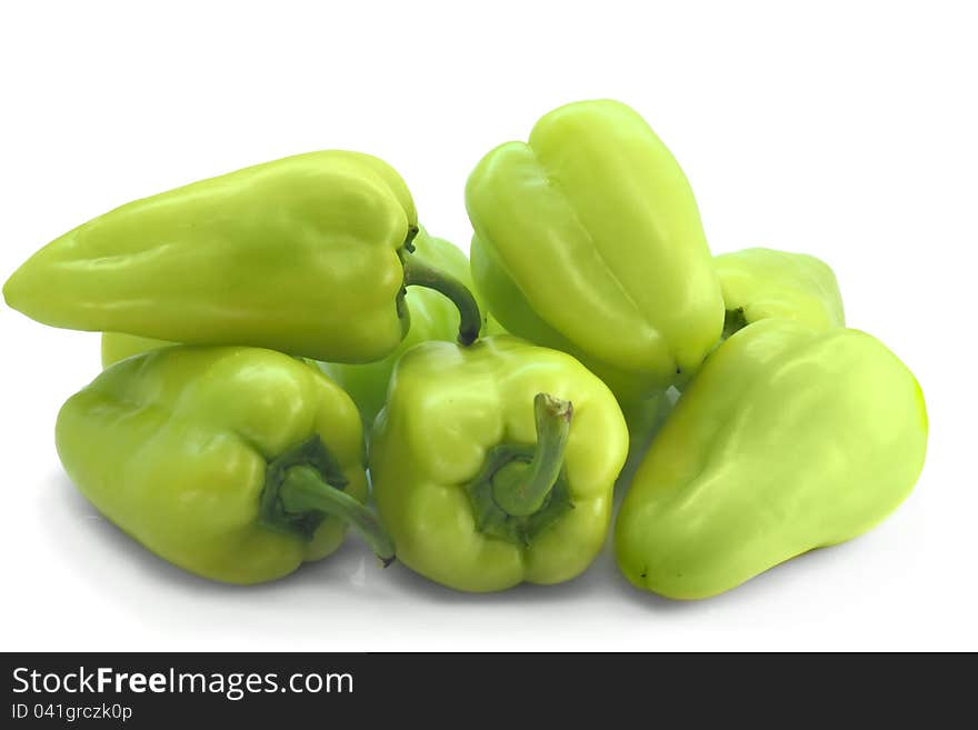 Green peppers on white