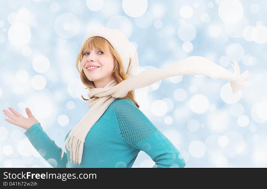 Christmas portrait of a beautiful  happy girl with scarf fluttering. Christmas portrait of a beautiful  happy girl with scarf fluttering