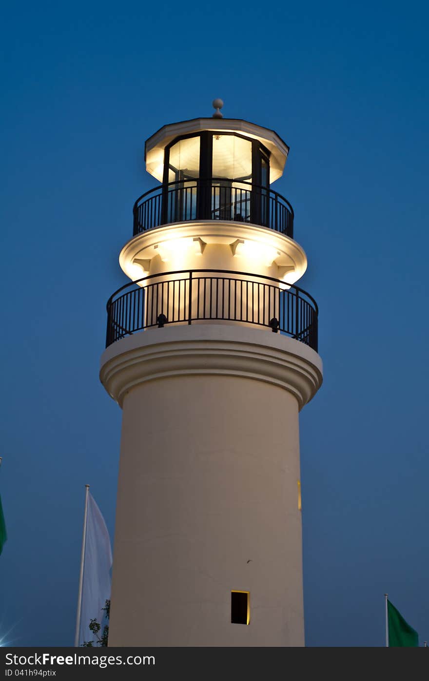 Lighthouse with lighting in the evening,Thailand