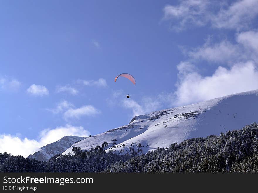 Man paragliding on mountain hill. Man paragliding on mountain hill