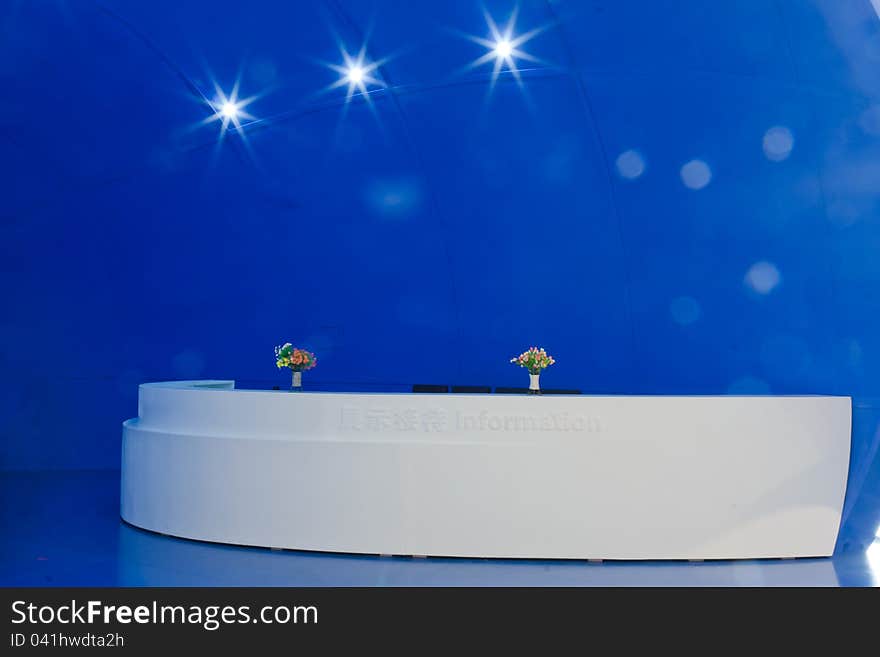 Reception desk with blue background