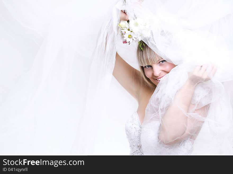 Beautiful bride in white veil