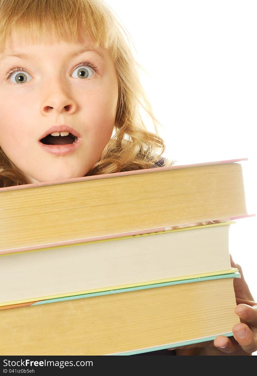 Surprised girl with big books, isolated on white. Surprised girl with big books, isolated on white