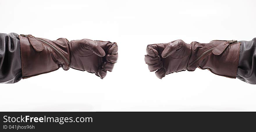 Men's hands in leather gloves holding something, isolated on white background. Men's hands in leather gloves holding something, isolated on white background