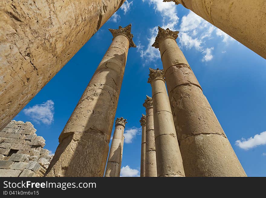 Columns reaching for the sky in the temple of Artemis at Jerash, Jordan. These mammoth pillars, built almost two millennia ago were designed to sway gently, absorbing the effects of earth tremors and high winds. Columns reaching for the sky in the temple of Artemis at Jerash, Jordan. These mammoth pillars, built almost two millennia ago were designed to sway gently, absorbing the effects of earth tremors and high winds.