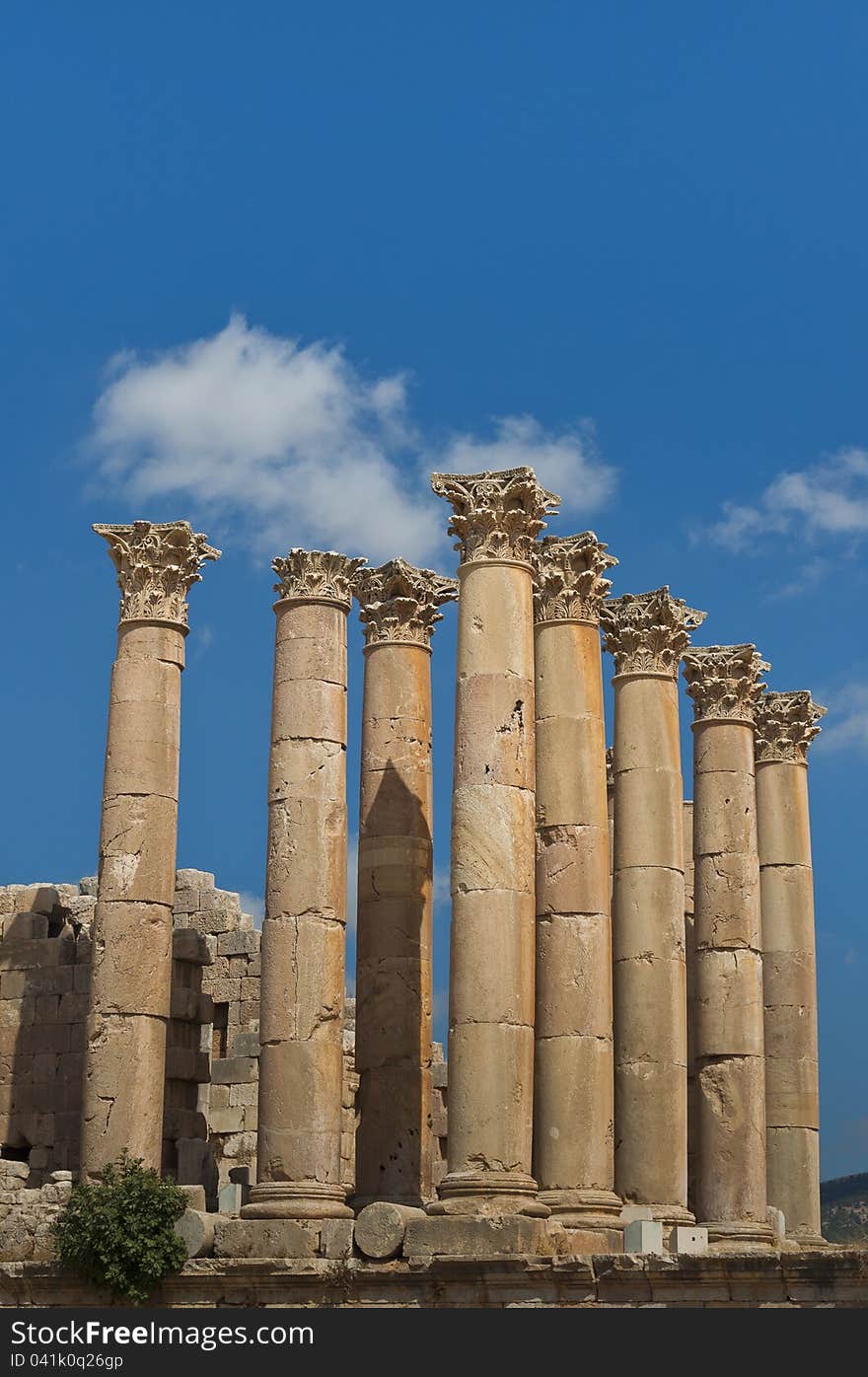 Eight columns with capstones in the Temple of Artemis, on a blue sky. These mammoth pillars, built almost two millennia ago were designed to sway gently, absorbing the effects of earth tremors and high winds. Eight columns with capstones in the Temple of Artemis, on a blue sky. These mammoth pillars, built almost two millennia ago were designed to sway gently, absorbing the effects of earth tremors and high winds.