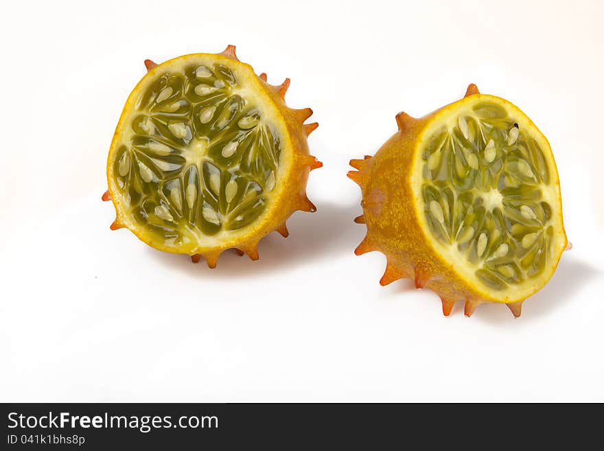 A kiwano cut in two pieces. A kiwano cut in two pieces