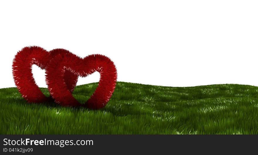 Two fluffy hearts on a green field