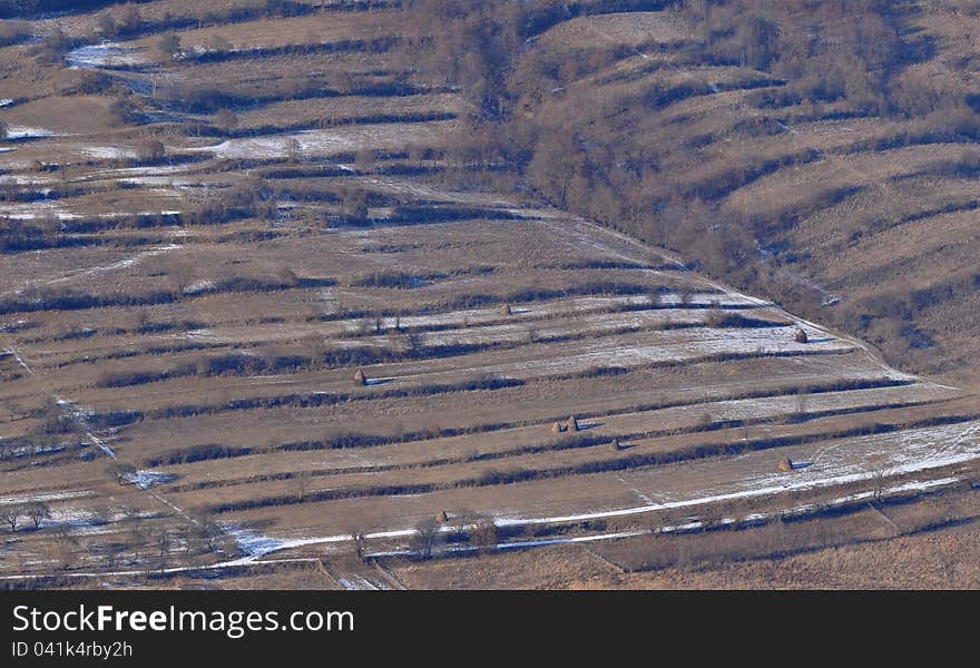 Aerial view of agricultural meadows and fields