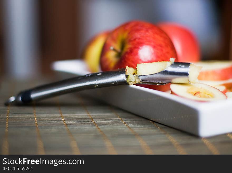 Taking out an apple core. Taking out an apple core