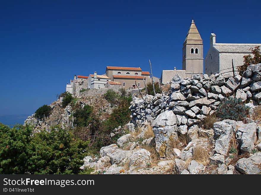 The old village on a rock on the Croatian island of Cres. The old village on a rock on the Croatian island of Cres