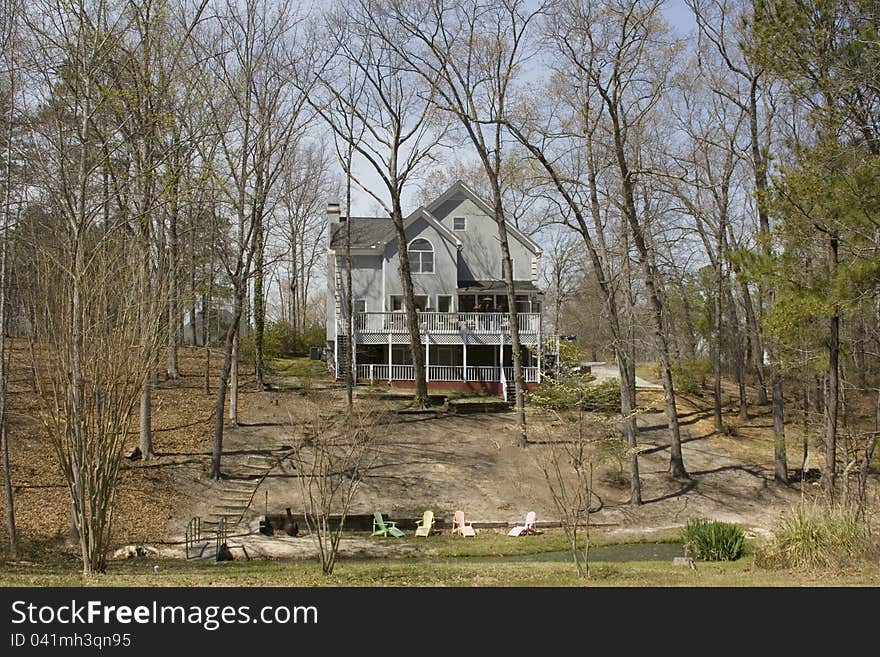 White house in forest in springtime in South Carolina. White house in forest in springtime in South Carolina