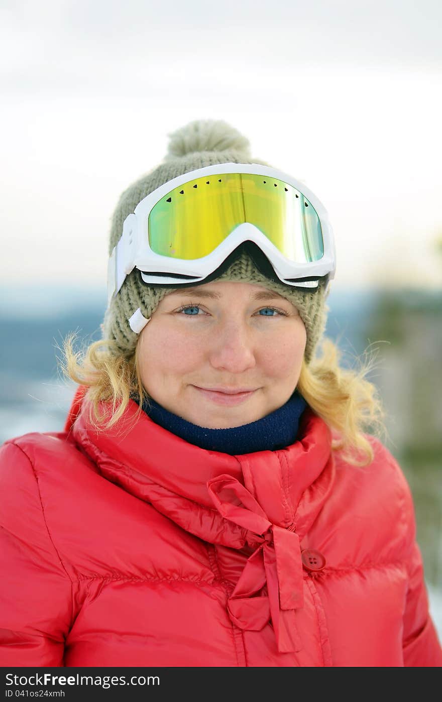 Portrait of girl with blue eyes in goggles