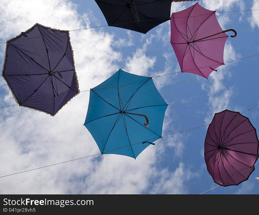 Umbrellas in the sky