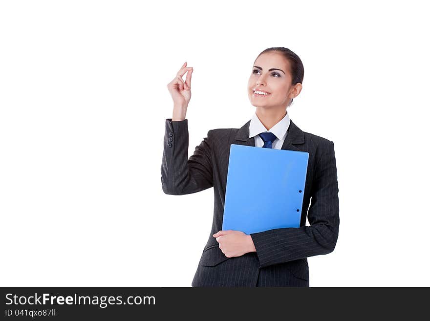 Young businesswoman standing with file folder smiling. Young businesswoman standing with file folder smiling