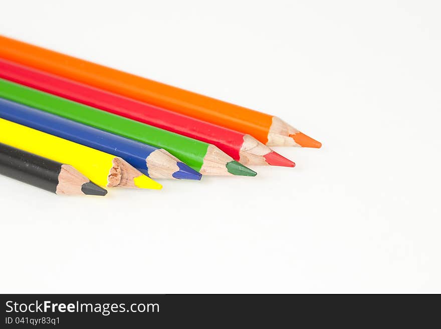 Pencils of different colors on a white background. Pencils of different colors on a white background