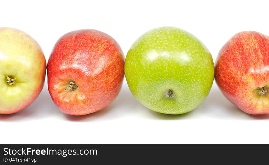 Four delicious apples on white background