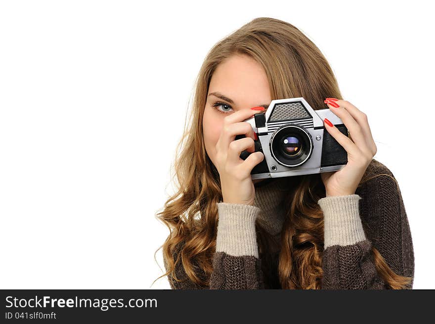 Pretty woman  with vintage camera on a white background