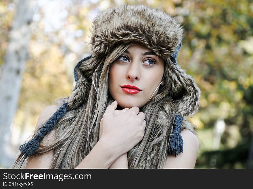 Portrait Of Beautiful Girl With The Winter Hat On