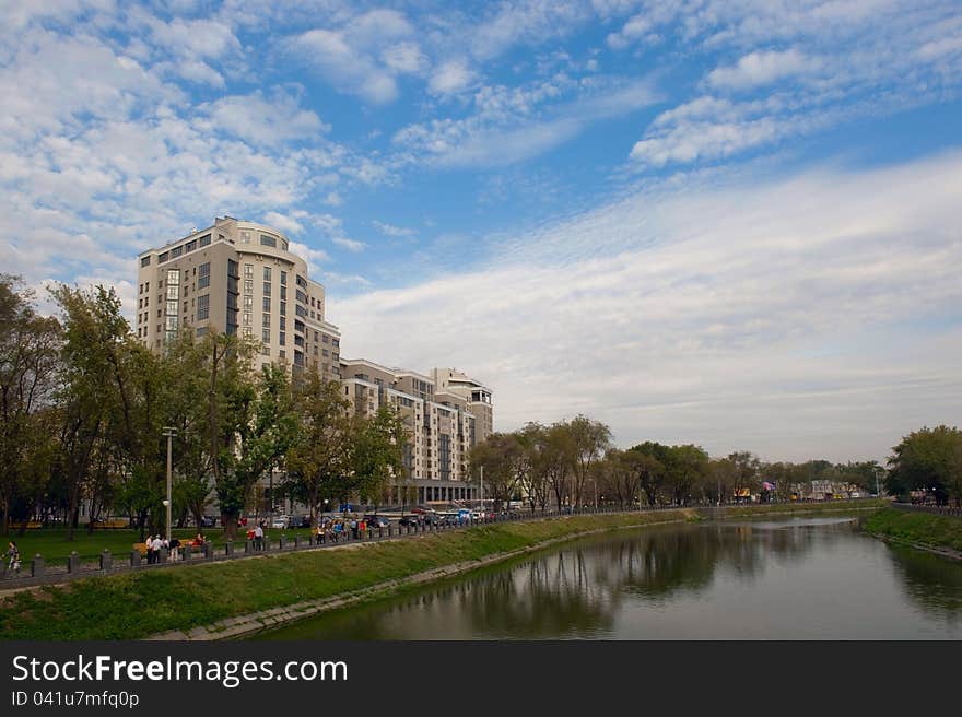 Portrait of urban landscape of parkland and river with a beautiful skyline. Portrait of urban landscape of parkland and river with a beautiful skyline