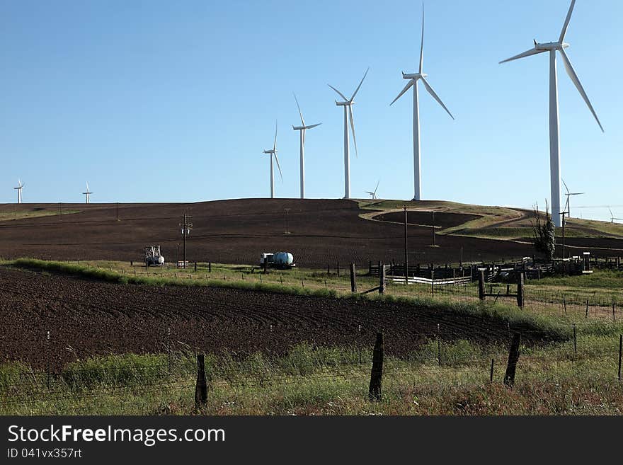 Wind energy turbines and farmland.