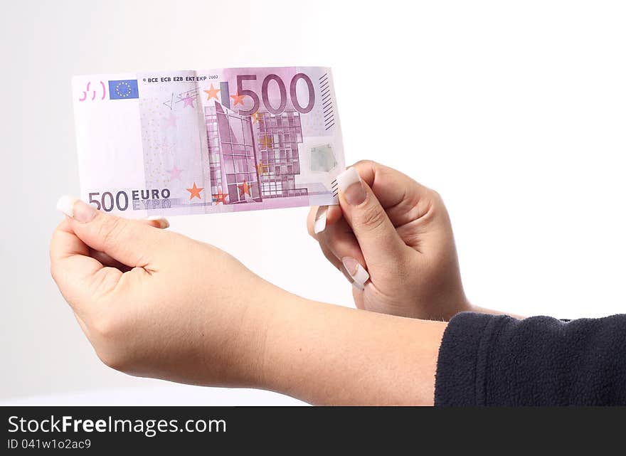 500 euro in the hand of a woman, white background