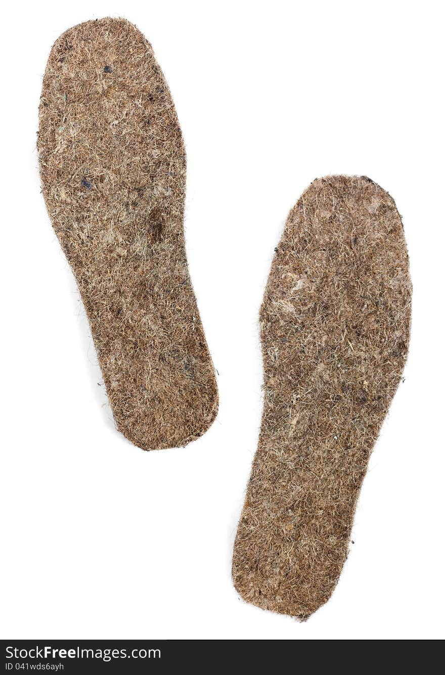 Felt insoles on white background