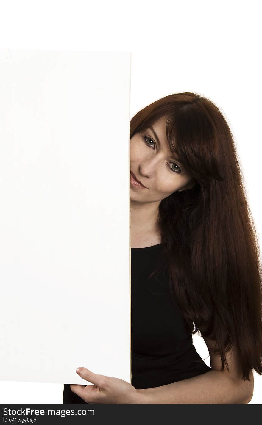 Smiling young woman with a blank board isolates on white background