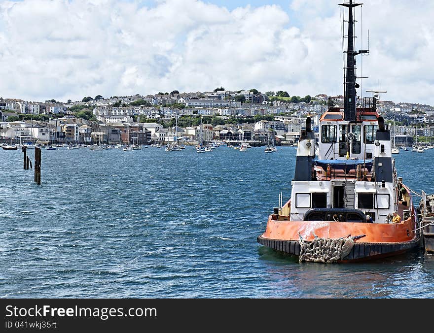 Tugboat moored in the port