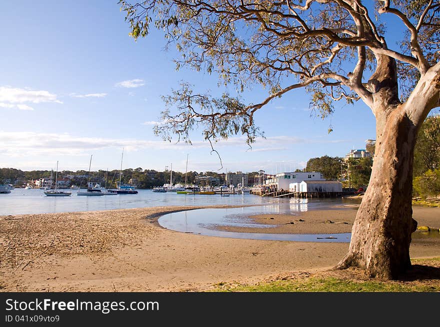 Gunnamatta Bay with yachts on the small port and old big tree. Cronulla, Sydney

Gunnamatta Bay is a small bay in southern Sydney, New South Wales, Australia.
Gunnamatta Bay is located off the Port Hacking estuary, in the Sutherland Shire. The foreshore is a natural boundary for the suburbs of Cronulla to the east, Woolooware to the north and Burraneer to the west. Gunnamatta Bay with yachts on the small port and old big tree. Cronulla, Sydney

Gunnamatta Bay is a small bay in southern Sydney, New South Wales, Australia.
Gunnamatta Bay is located off the Port Hacking estuary, in the Sutherland Shire. The foreshore is a natural boundary for the suburbs of Cronulla to the east, Woolooware to the north and Burraneer to the west.