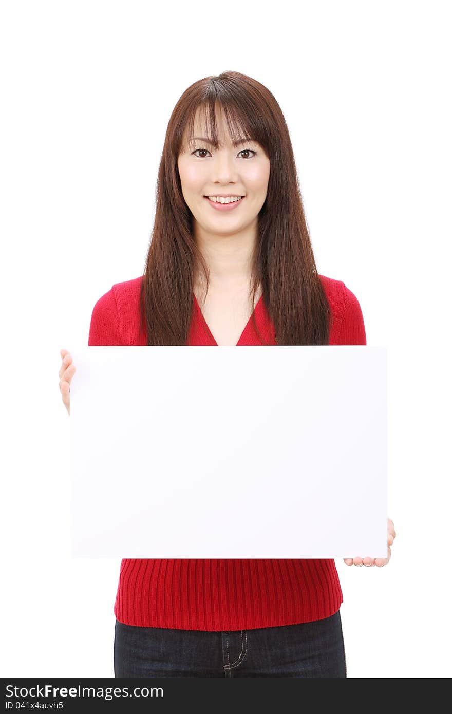 Young asian woman holding blank board in front