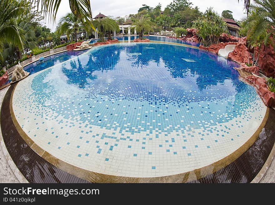 Children swimming pool decorated by shading blue mosaic