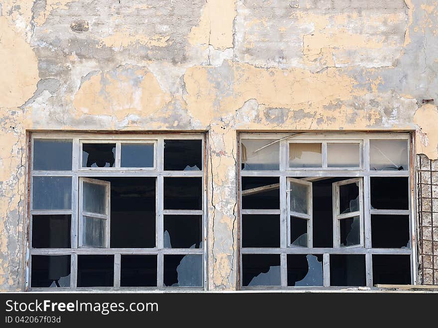 Broken windows of an old palace