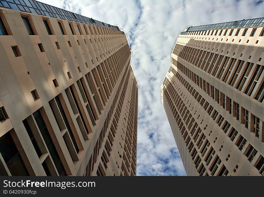 Two skyscrapers bottom view of the skyline